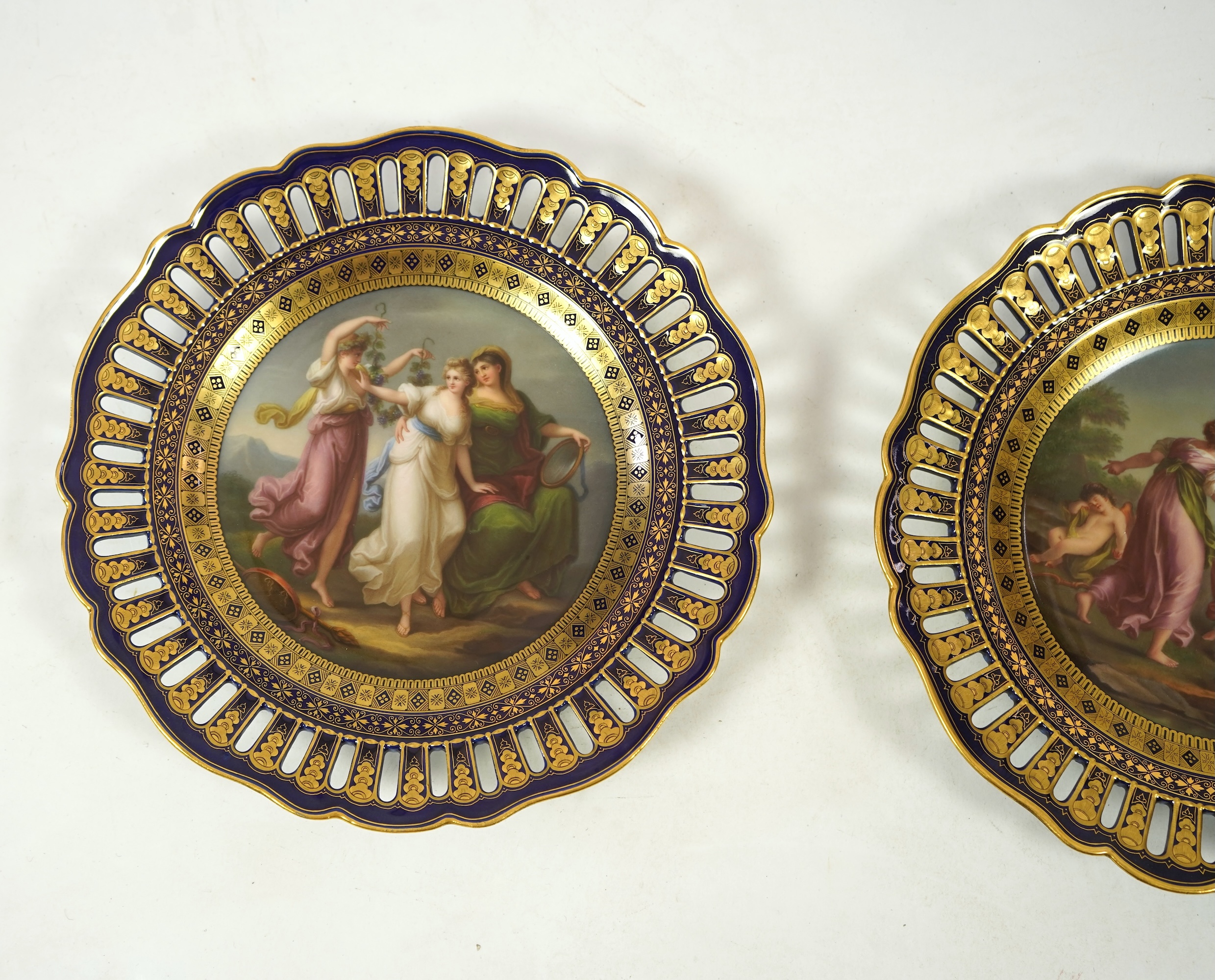 A pair of 19th century Meissen 'Three Graces' cabinet plates, after Angelica Kaufmann, 24cm in diameter. Condition - good